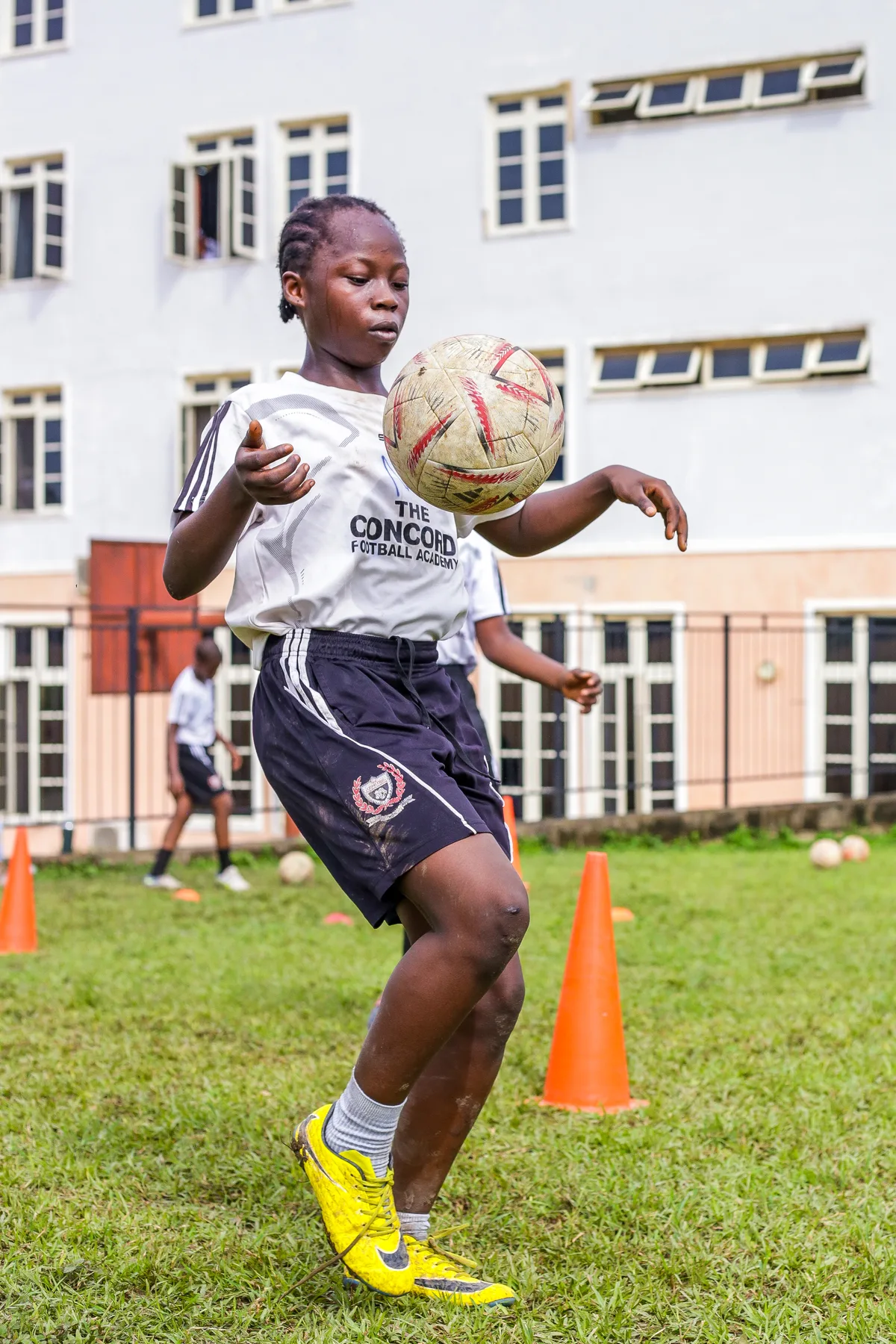Player controlling a football at close range