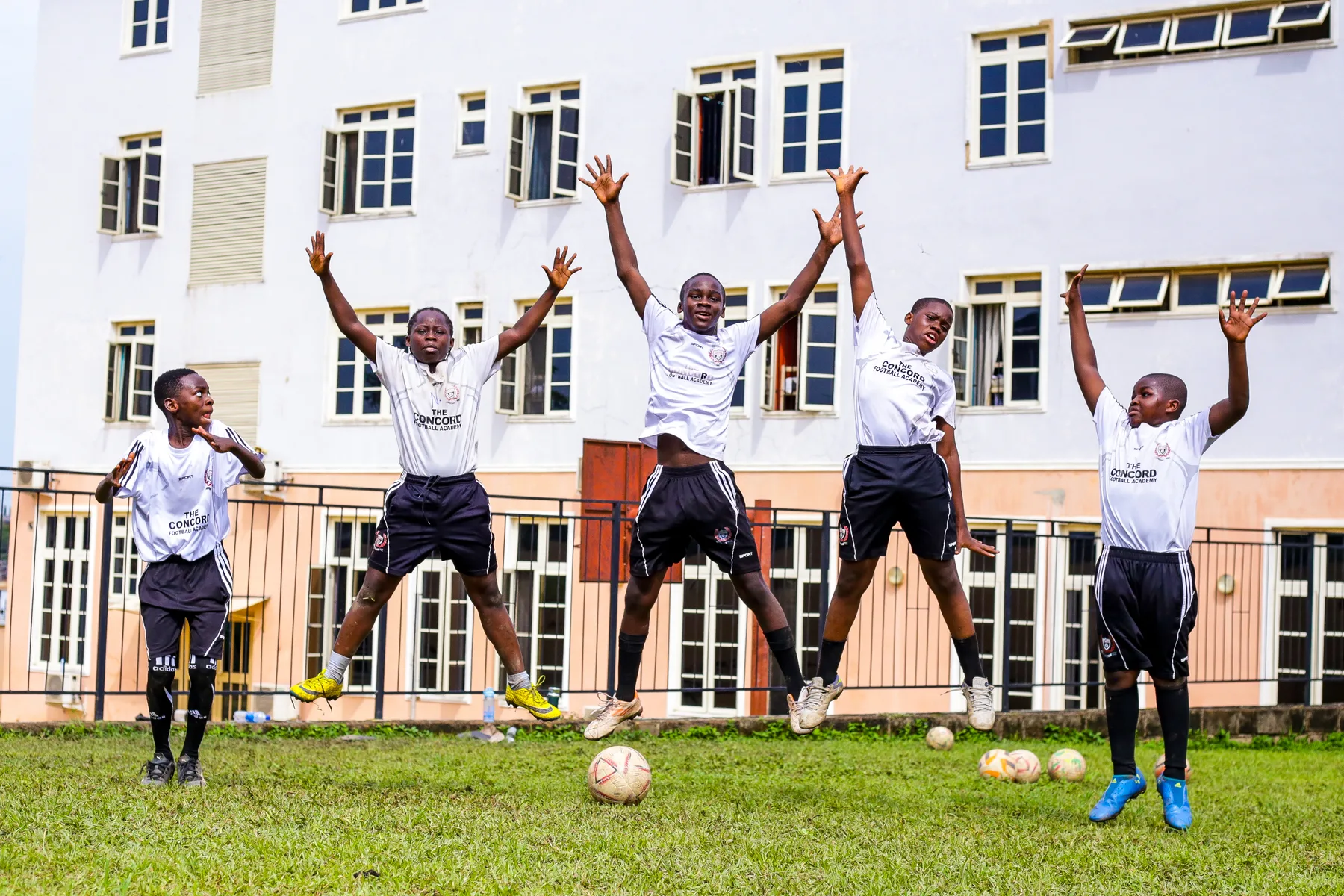 Academy players jumping together
